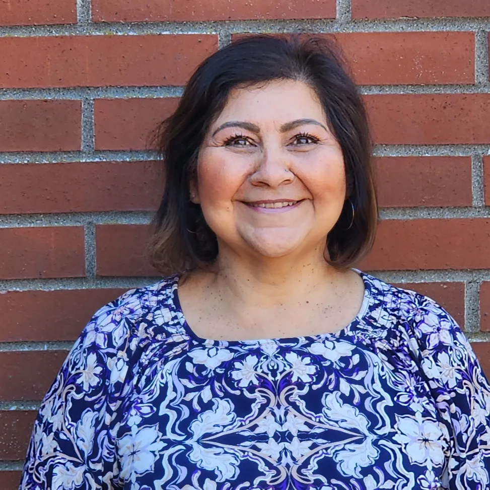 NM woman smiling in the outdoors