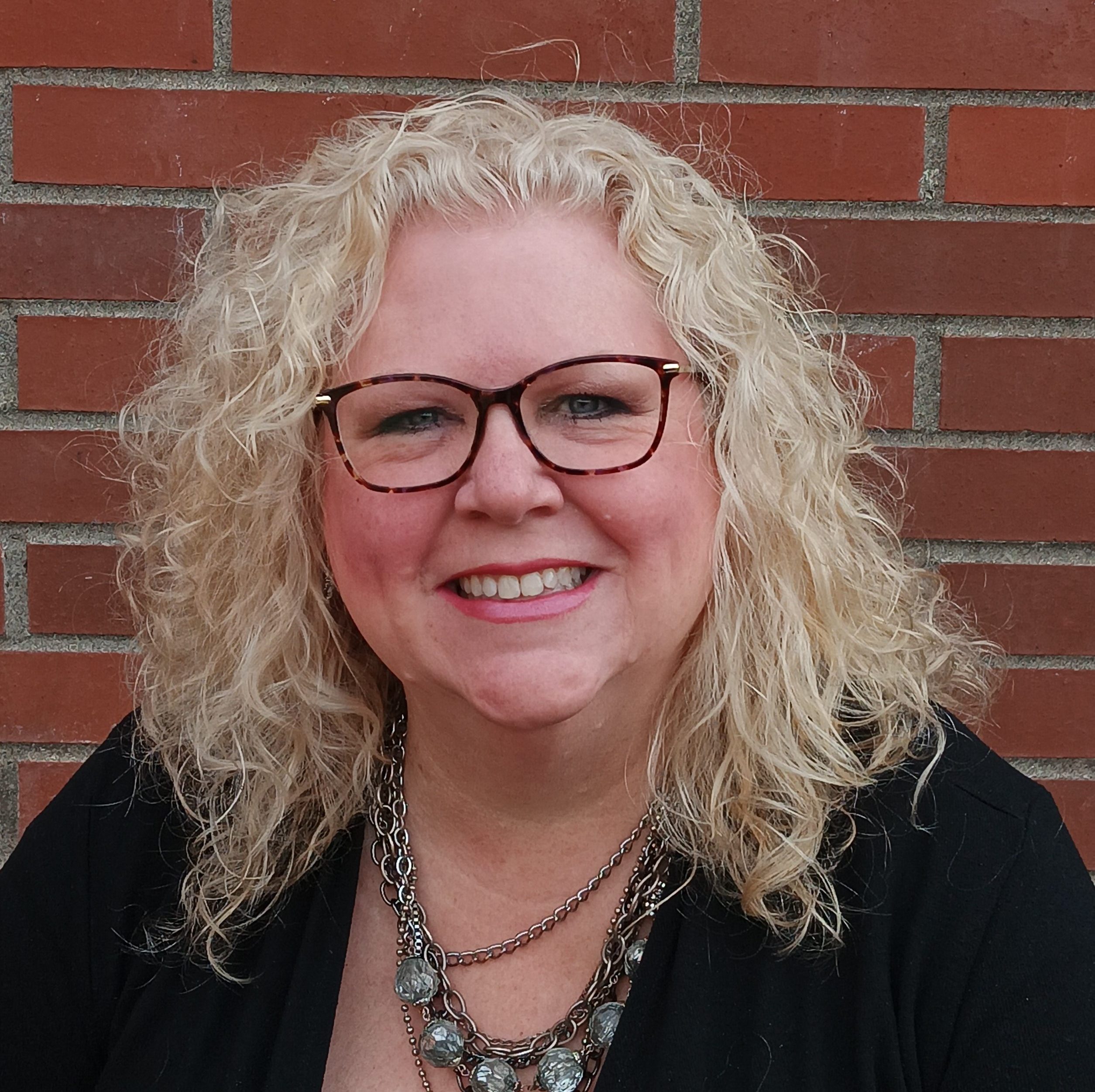 woman smiling in the outdoors