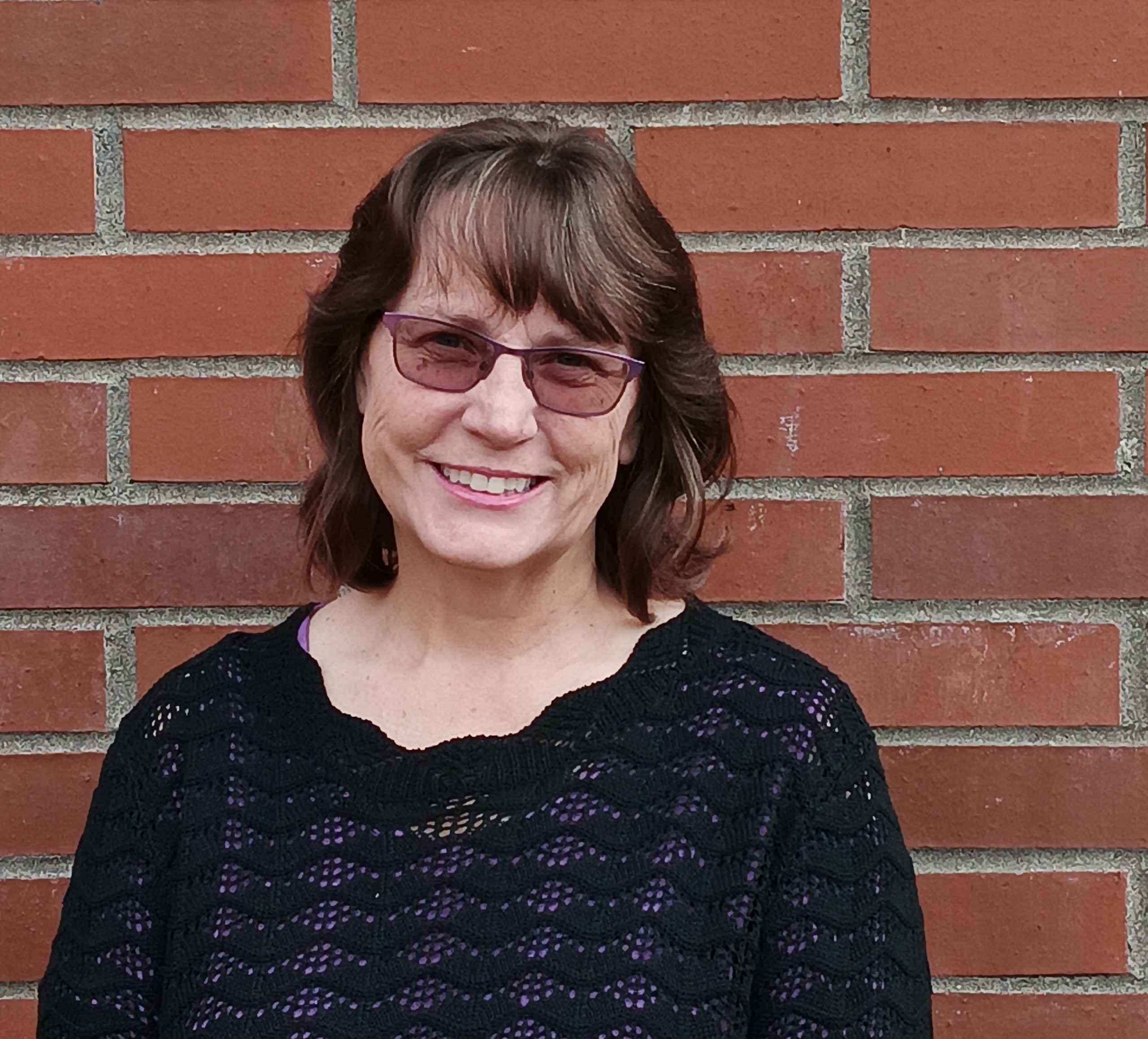 woman smiling in the outdoors