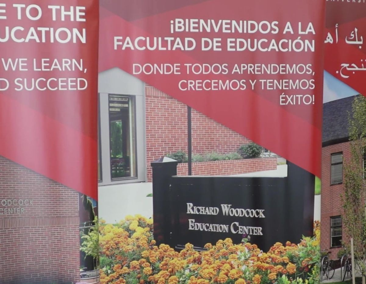 Photo of multilingual signage at a university