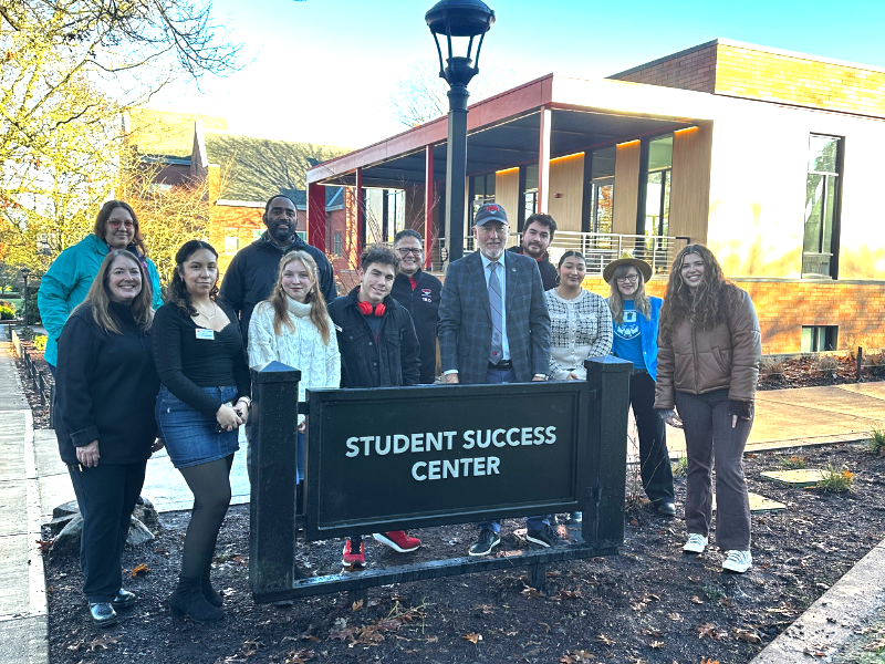 President Peters with WOU students