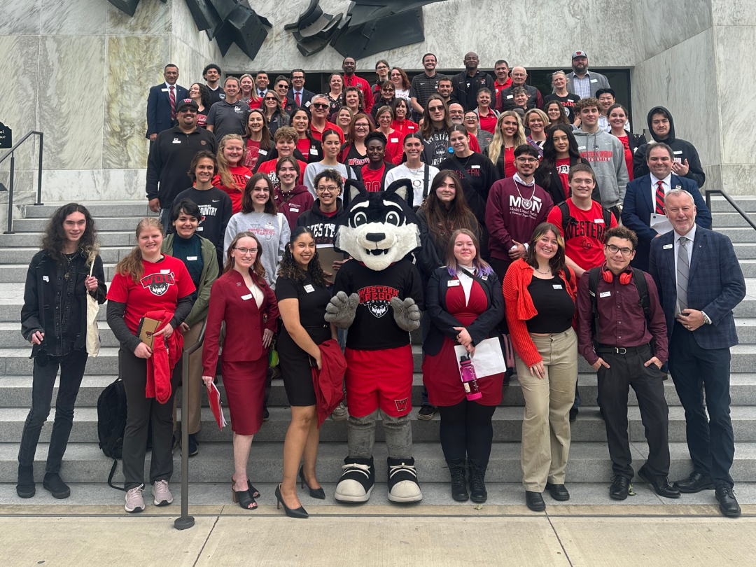Advocacy PR A group of students and staff standing on the steps on the state capitol