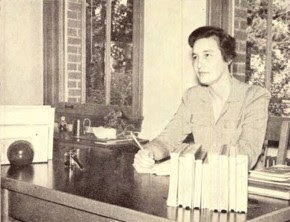 Old photograph of a woman at a desk