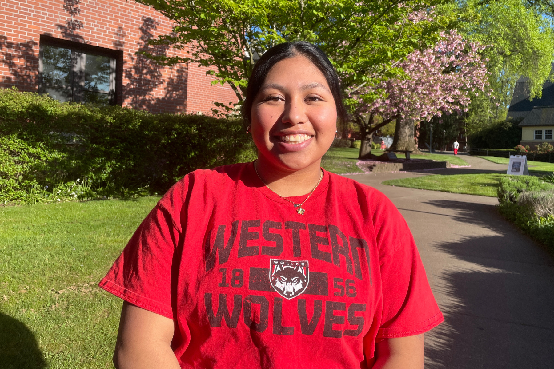 Ellie M-M - WOU Crew woman smiling in the outdoors