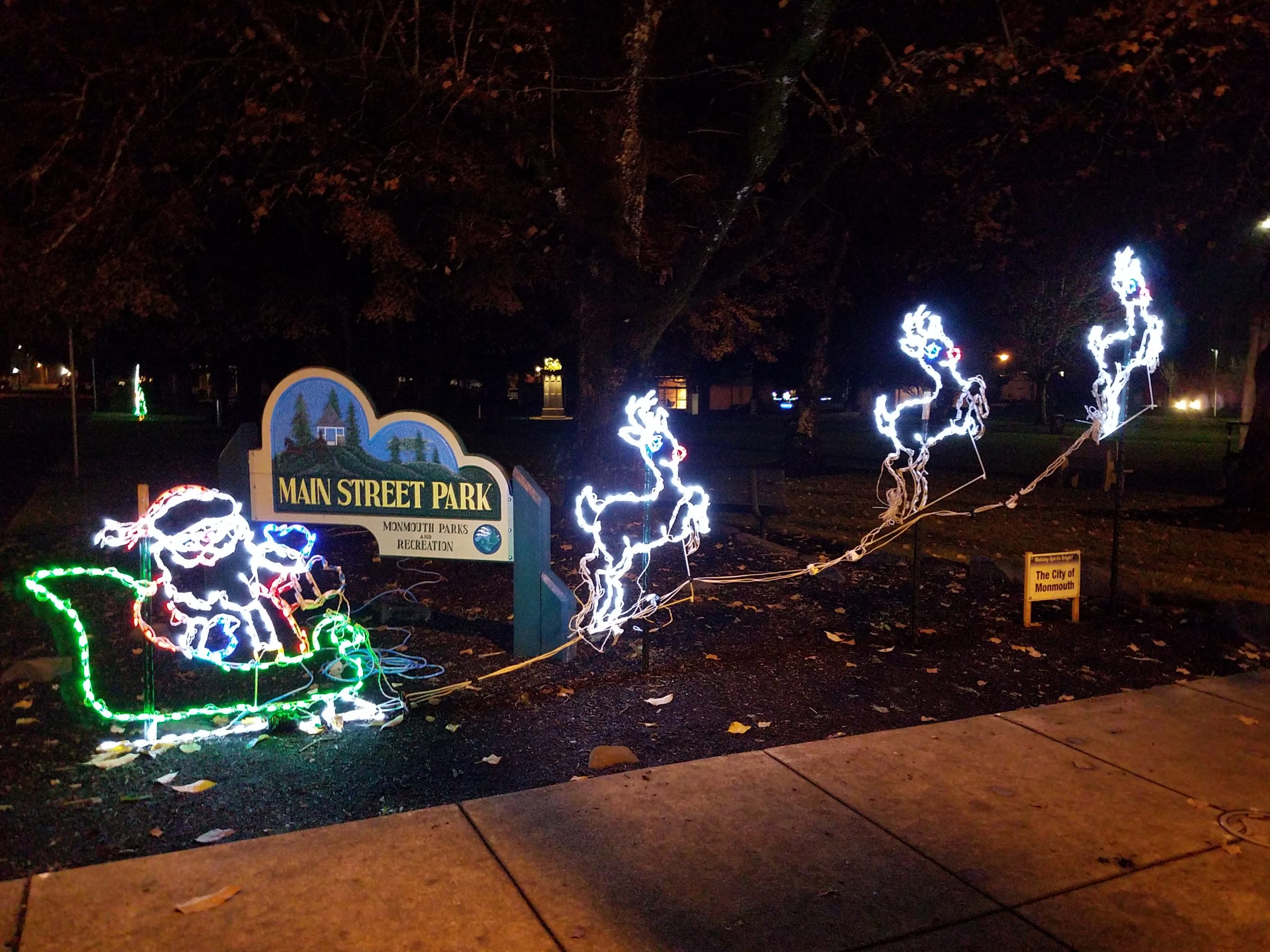 monmouth_making_spirits_bright Santa and reindeer Christmas light decoration from Monmouth's Making Spirits Bright event