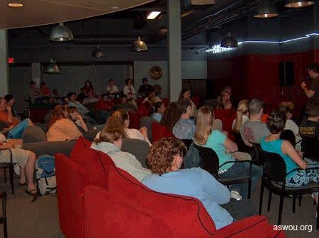 Students lounging in the Den.