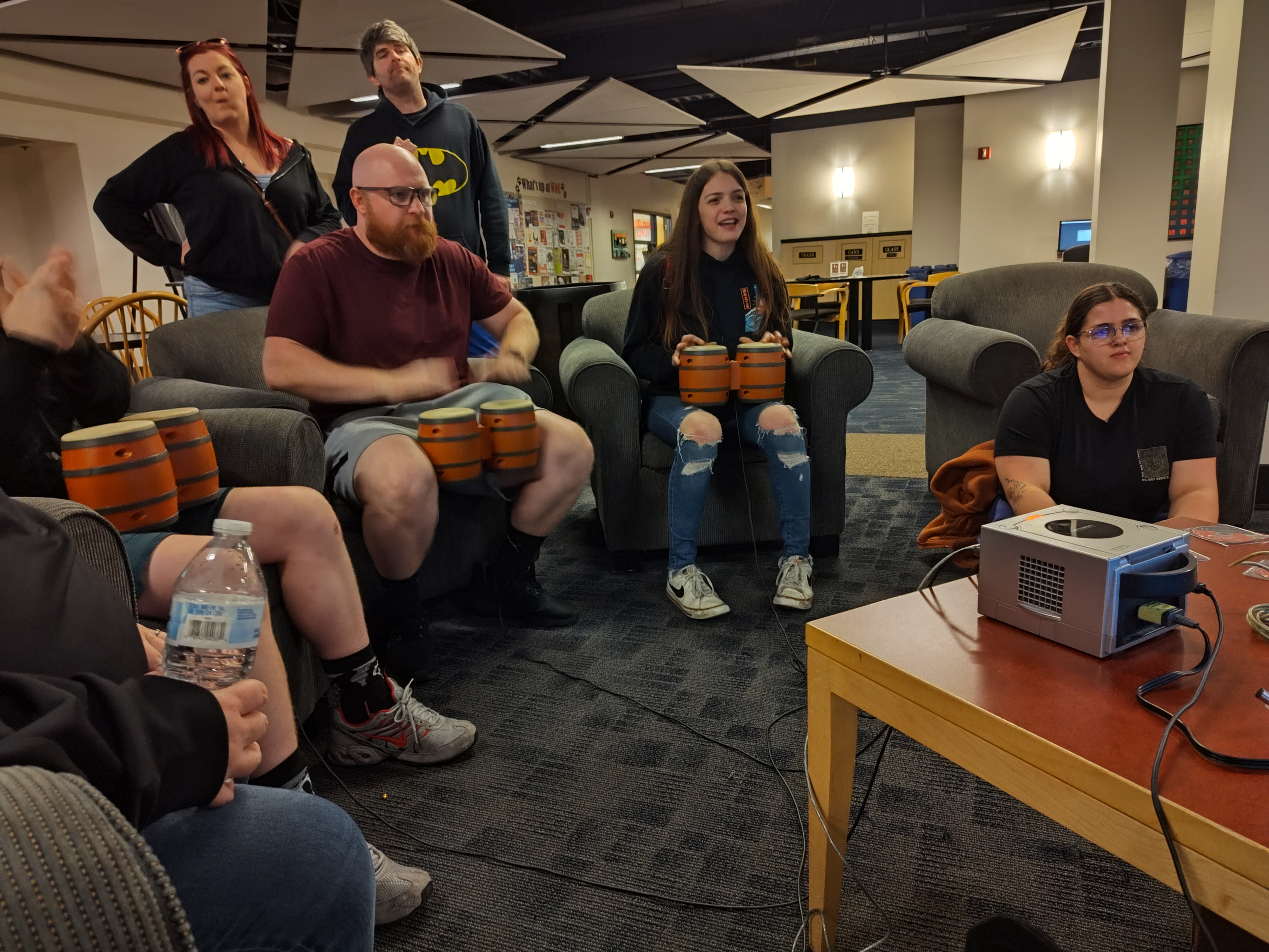 People playing a game with bongos.