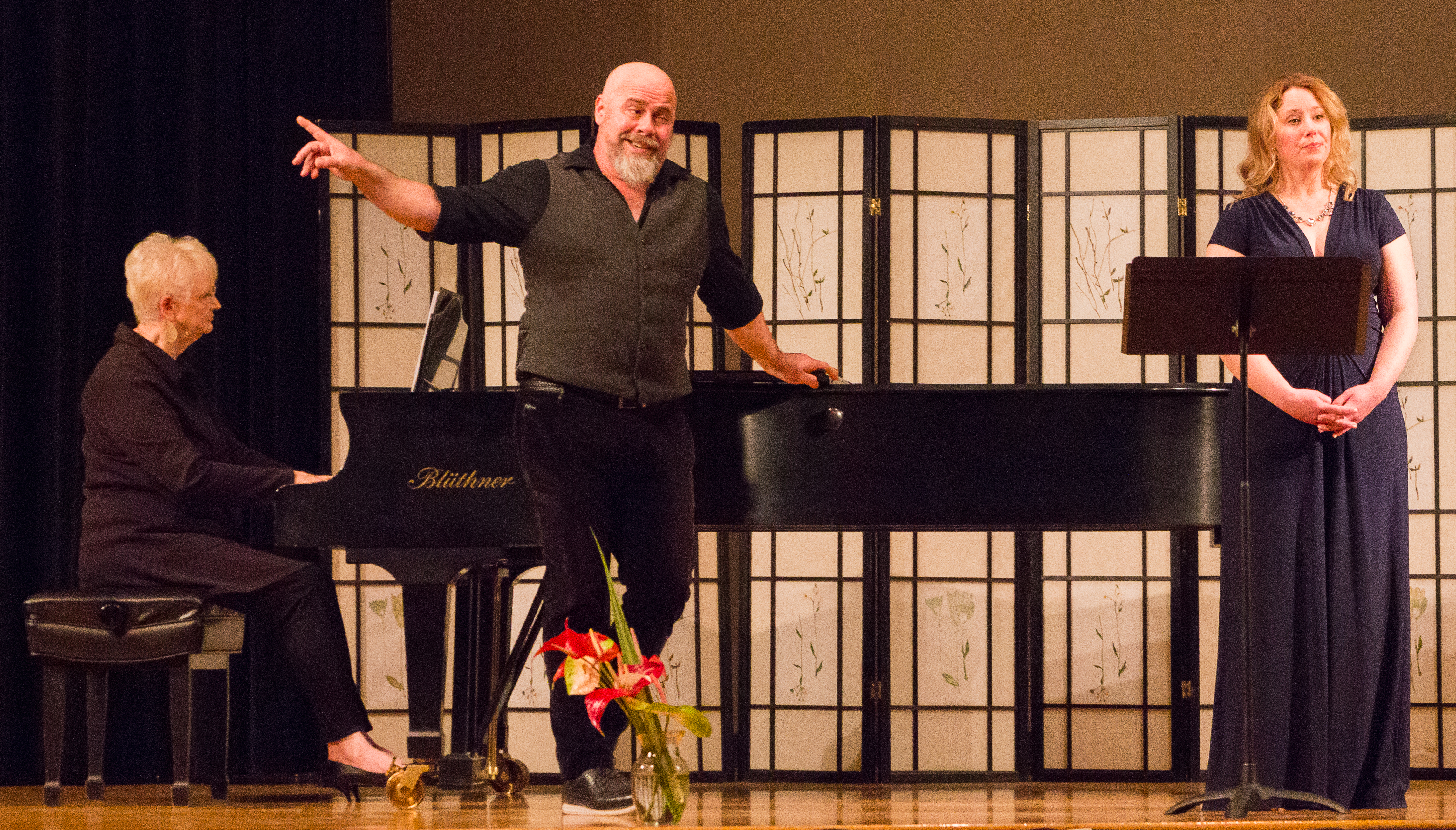 Musical guest, Deac Guidi, and staff serenade Smith Hall