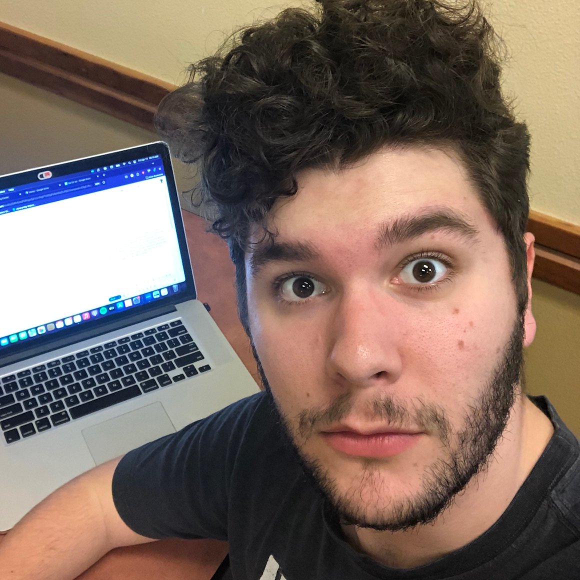 Young man staring intensely into the camera.