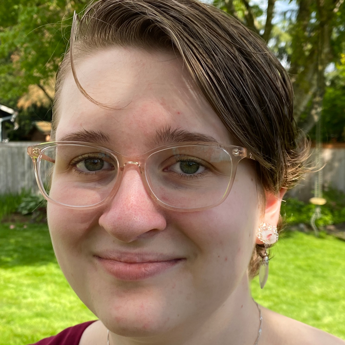 Young woman smiling.